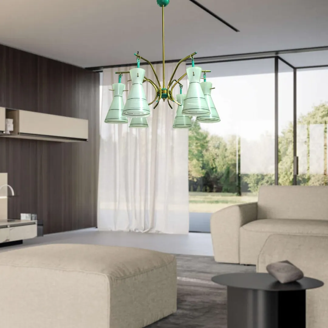 Ce lustre suspendu élégant évoque le style iconique de Stilnovo, avec une structure en laiton au design raffiné et des diffuseurs en verre dépoli aux formes effilées. Le laiton confère une chaleur unique, tandis que le verre dépoli diffuse une lumière douce et enveloppante. Idéal pour des espaces nécessitant une touche de classe intemporelle, ce lustre représente l'équilibre parfait entre design moderne et charme vintage, s'adaptant parfaitement à des espaces sophistiqués et de grand style.