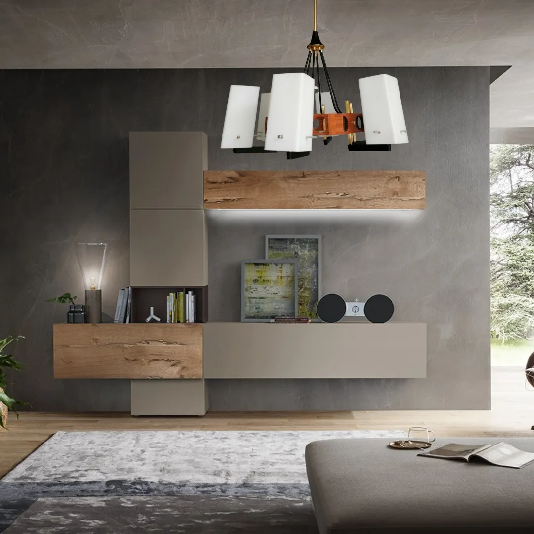 Le lustre suspendu avec six points lumineux en verre opalin, probablement attribué à Stilnovo, est un chef-d'œuvre de design élégant et fonctionnel. Ses diffuseurs délicats en verre créent une atmosphère chaleureuse et accueillante, le rendant idéal pour tout environnement, de la cuisine au salon. La combinaison de formes géométriques et de matériaux de haute qualité représente parfaitement l'esthétique des années 60, apportant une touche de modernité et de raffinement dans les espaces contemporains.