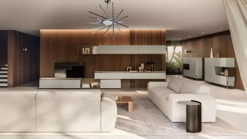 Le lustre suspendu Liuto, conçu par le designer Marco Zotta pour Bilumen, est une œuvre qui allie esthétique et fonctionnalité. Caractérisé par un design élégant et contemporain, le Liuto se distingue par sa forme inspirée des instruments de musique, en particulier du luth, dont il tire son nom. Caractéristiques principales : Design : La forme sinueuse et enveloppante du lustre crée un jeu de lumières et d'ombres, le rendant idéal pour des environnements modernes. Matériaux : Fabriqué à partir de matériaux de haute qualité, comme le métal, le Liuto est conçu pour garantir durabilité et éclairage efficace. Polyvalence : Il peut être utilisé dans divers environnements, du salon aux restaurants et espaces publics, grâce à sa capacité à s'adapter à différents styles de décoration. Éclairage : Il offre un éclairage diffus, créant une atmosphère chaleureuse et accueillante. Style et utilisation : Le lustre Liuto est parfait pour ceux qui recherchent un élément de design distinctif pour enrichir l'espace. Il est idéal dans des contextes minimalistes ou contemporains, mais peut également être adapté à des interprétations plus classiques lorsqu'il est combiné judicieusement.
